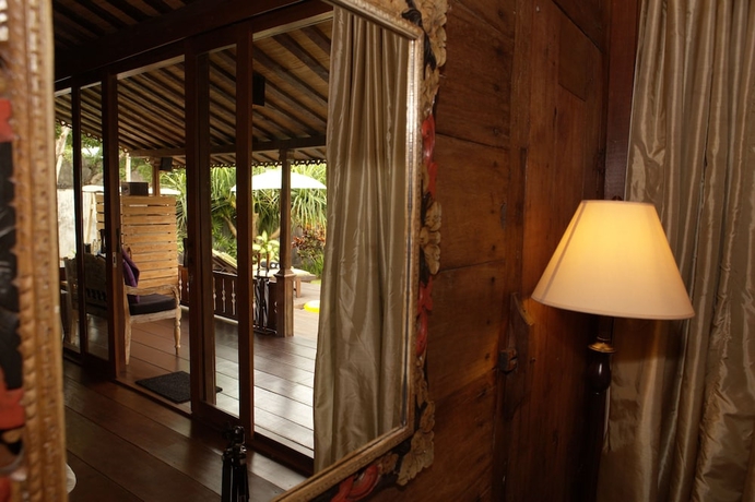 Imagen de la habitación del Hotel KajaNe Tulamben. Foto 5