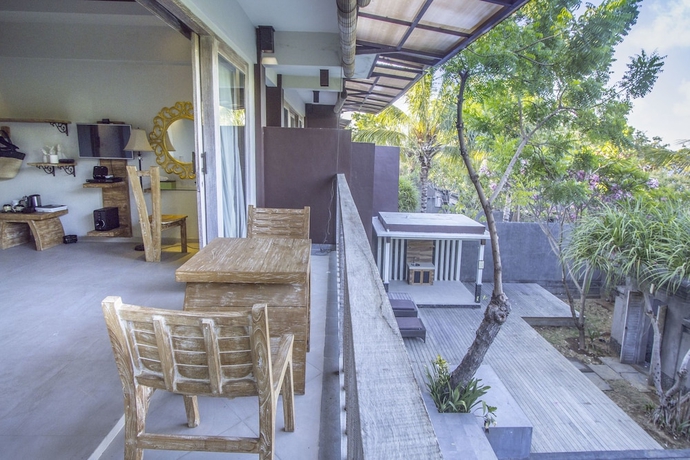 Imagen de la habitación del Hotel KajaNe Tulamben. Foto 10