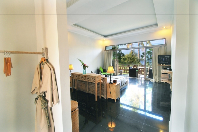 Imagen de la habitación del Hotel KajaNe Tulamben. Foto 17