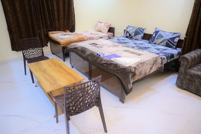 Imagen de la habitación del Hotel Kaka Paying Guest House. Foto 4