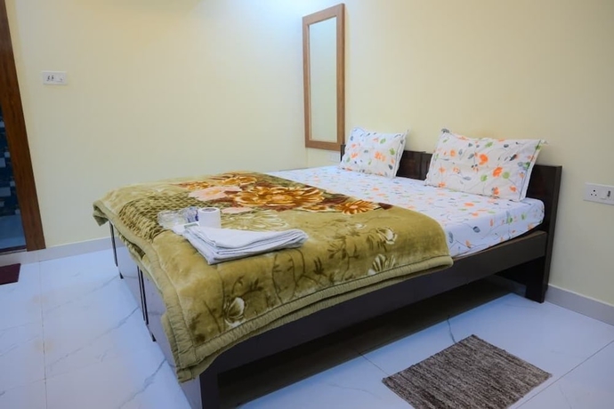 Imagen de la habitación del Hotel Kaka Paying Guest House. Foto 5