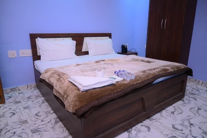 Imagen de la habitación del Hotel Kaka Paying Guest House. Foto 7