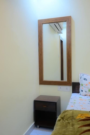 Imagen de la habitación del Hotel Kaka Paying Guest House. Foto 10