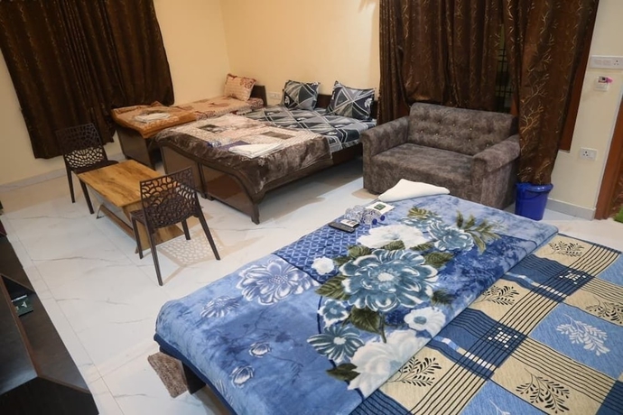 Imagen de la habitación del Hotel Kaka Paying Guest House. Foto 12