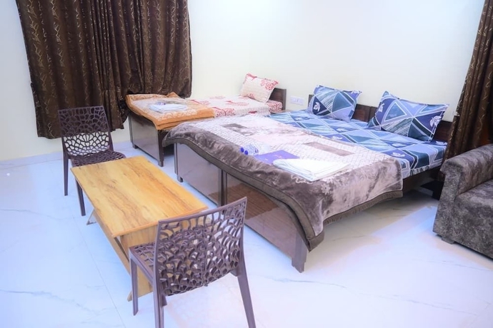Imagen de la habitación del Hotel Kaka Paying Guest House. Foto 13
