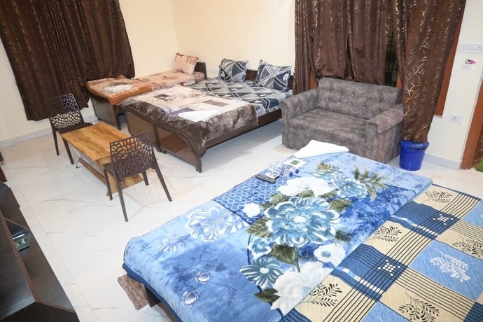 Imagen de la habitación del Hotel Kaka Paying Guest House. Foto 14