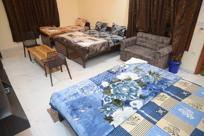 Imagen de la habitación del Hotel Kaka Paying Guest House. Foto 15