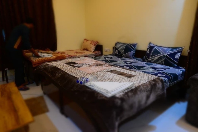 Imagen de la habitación del Hotel Kaka Paying Guest House. Foto 16
