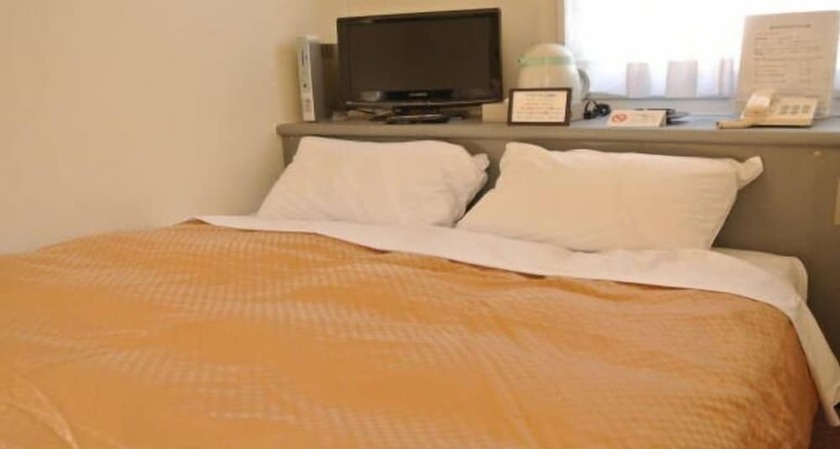 Imagen de la habitación del Hotel Kakegawa Business Ekinan-inn. Foto 20