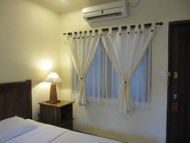 Imagen de la habitación del Hotel Kakiang Bungalows. Foto 6