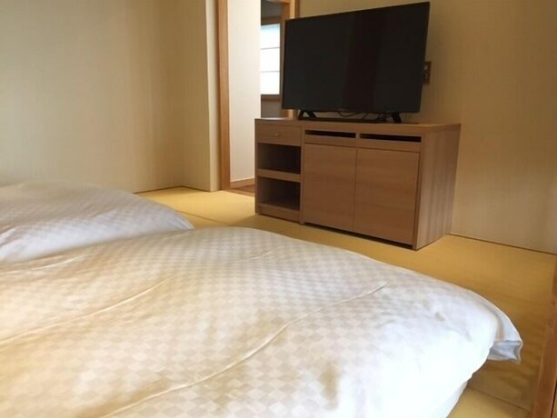 Imagen de la habitación del Hotel Kakimotoya, Sango. Foto 11