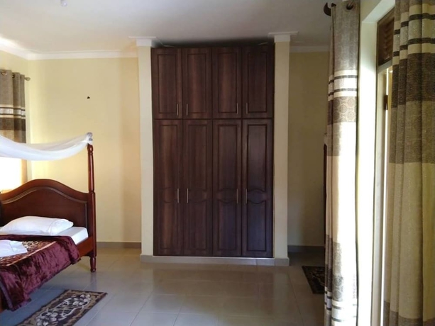 Imagen de la habitación del Hotel Kalalo Cottage Inn. Foto 13