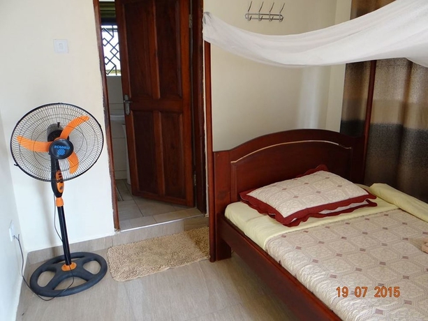 Imagen de la habitación del Hotel Kalalo Cottage Inn. Foto 14