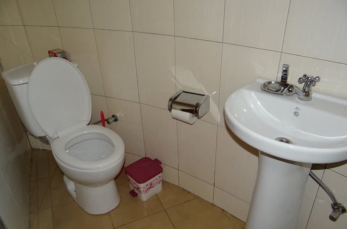 Imagen de la habitación del Hotel Kalalo Cottage Inn. Foto 17