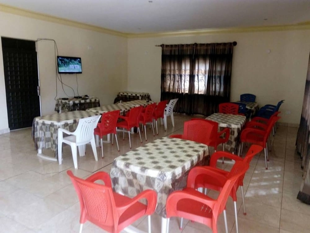 Imagen del bar/restaurante del Hotel Kalalo Cottage Inn. Foto 9