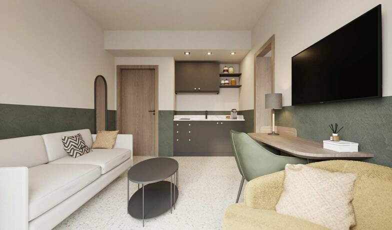 Imagen de la habitación del Hotel Kalamata Mediterranean Suites and Villas. Foto 20