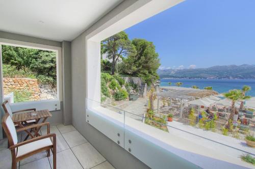 Imagen de la habitación del Hotel Kalamota Beach House. Foto 10