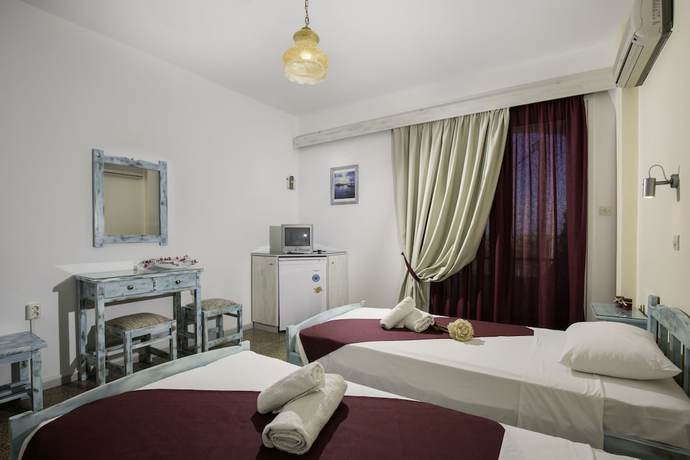 Imagen de la habitación del Hotel Kalathos Sun. Foto 17
