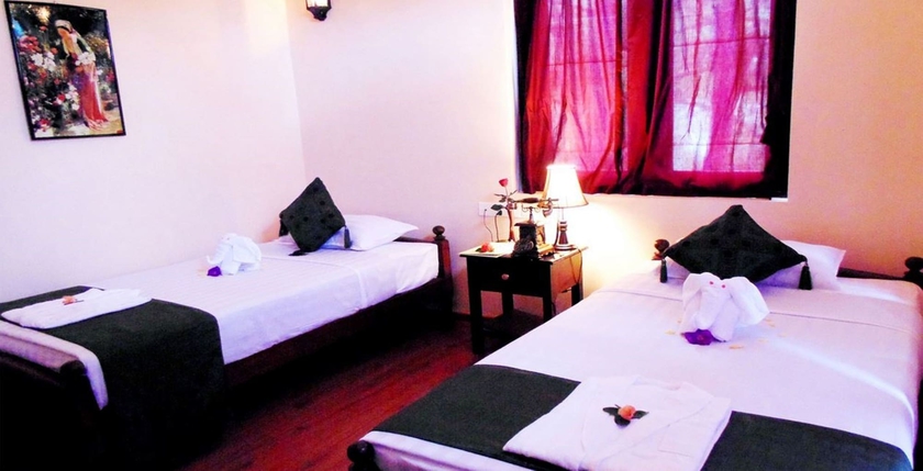 Imagen de la habitación del Hotel Kalaw Princess. Foto 8