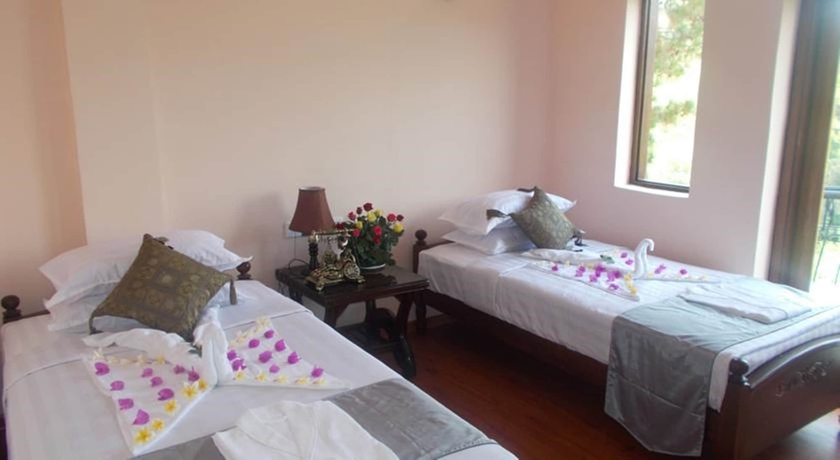 Imagen de la habitación del Hotel Kalaw Princess. Foto 16