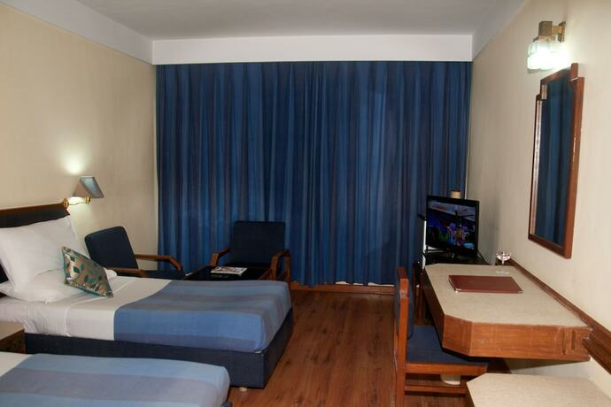 Imagen de la habitación del Hotel Kalinga Ashok. Foto 19