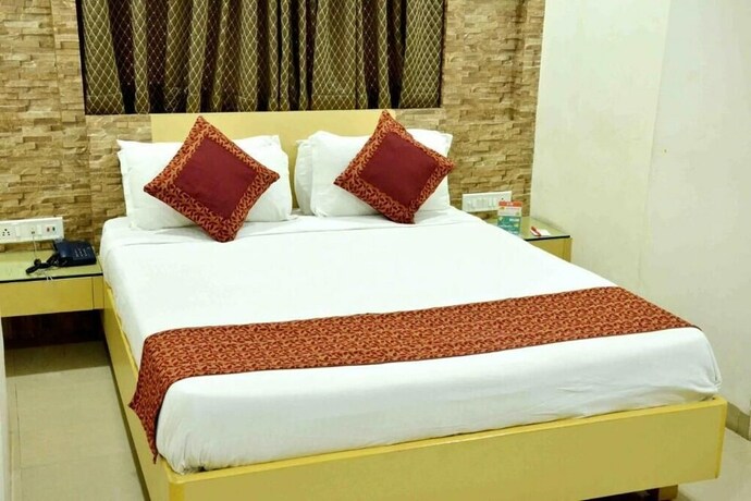 Imagen de la habitación del Hotel Kalinga, Indore. Foto 13