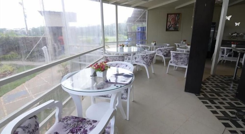 Imagen del bar/restaurante del Hotel Kalki Resort and Cottages baga. Foto 7