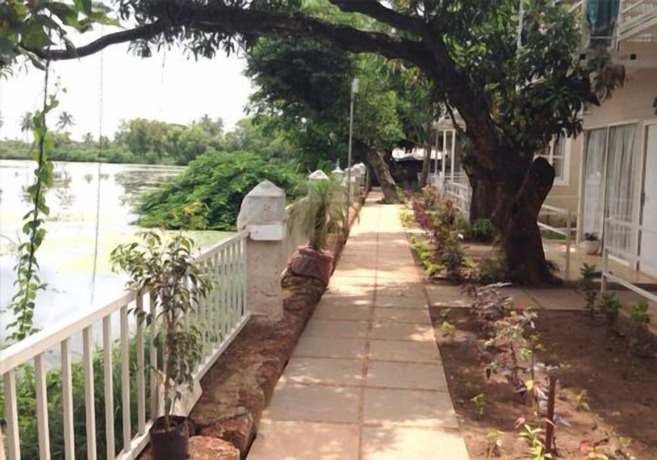 Imagen de los exteriores del Hotel Kalki Resort and Cottages baga. Foto 17