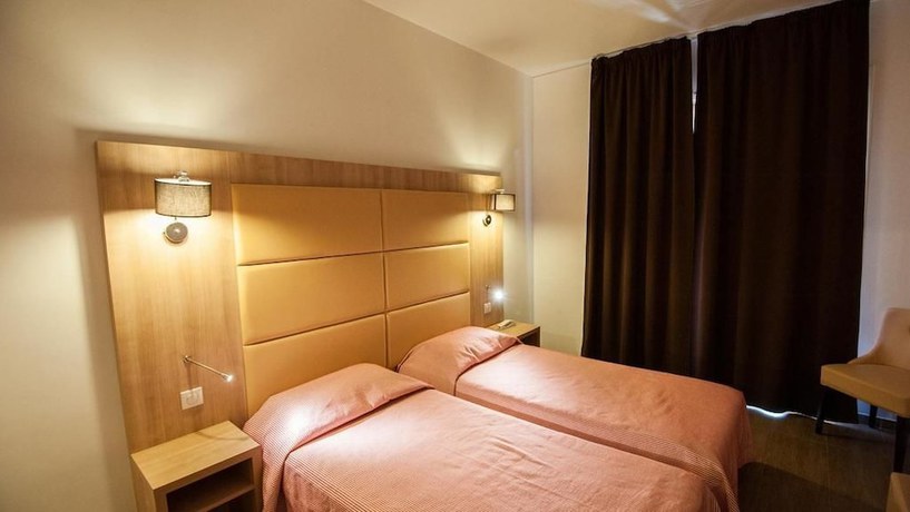 Imagen de la habitación del Hotel Kalliste, Ota. Foto 2