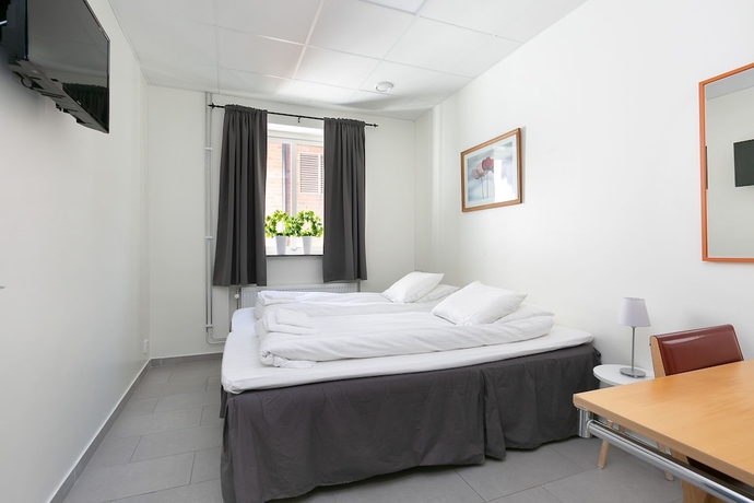Imagen de la habitación del Hotel Kalmar Hotell. Foto 17