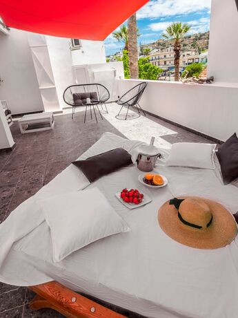 Imagen de la habitación del Hotel Kalypso Suites. Foto 18