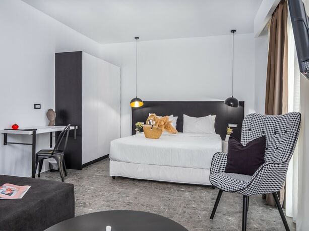 Imagen de la habitación del Hotel Kalypso Suites. Foto 19