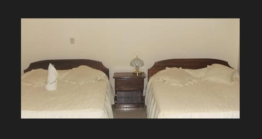 Imagen de la habitación del Hotel Kam Tu. Foto 9