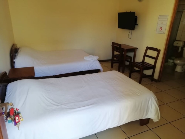 Imagen de la habitación del Hotel Kam Tu. Foto 10