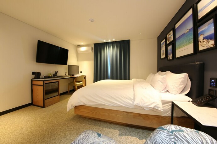 Imagen de la habitación del Hotel Kama Hotel. Foto 16