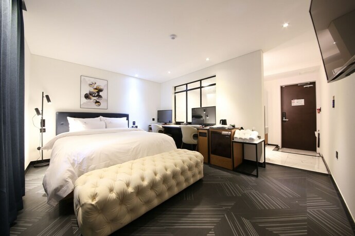 Imagen de la habitación del Hotel Kama Hotel. Foto 34