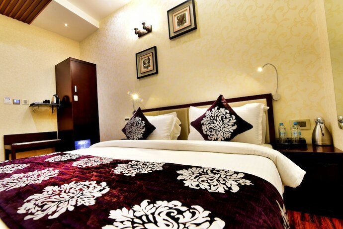 Imagen de la habitación del Hotel Kama International. Foto 4