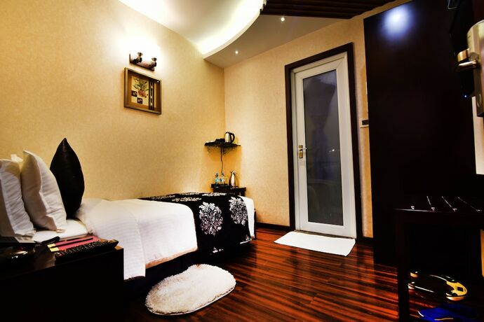 Imagen de la habitación del Hotel Kama International. Foto 16