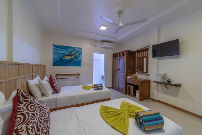 Imagen de la habitación del Hotel Kamadhoo Inn. Foto 13