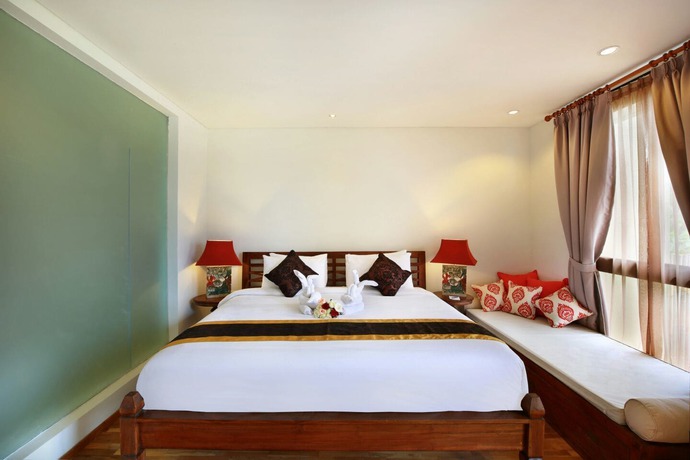 Imagen de la habitación del Hotel Kamajaya Villas Bali. Foto 12