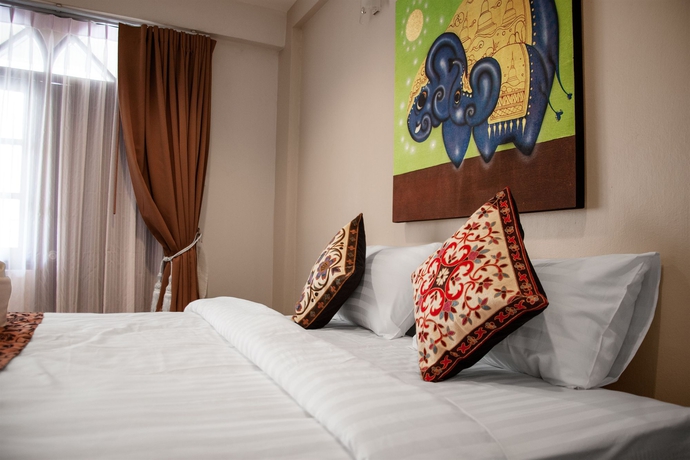 Imagen de la habitación del Hotel Kamala's Boutique Guesthouse. Foto 6
