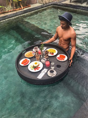 Imagen de la piscina del Hotel Kamandhani Ubud. Foto 17