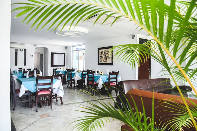 Imagen del bar/restaurante del Hotel Kamani Florencia. Foto 4