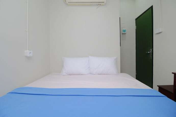 Imagen general del Hotel Kamar Keluarga Bandara IV Syariah. Foto 2