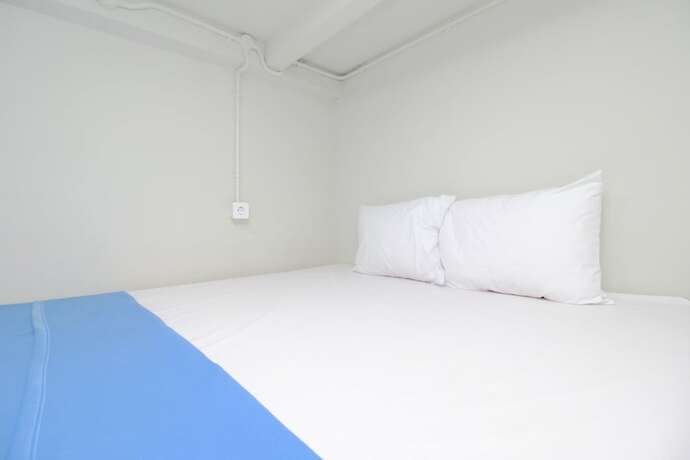 Imagen general del Hotel Kamar Keluarga Bandara IV Syariah. Foto 9
