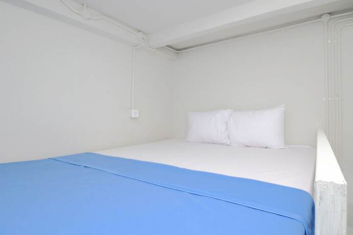 Imagen general del Hotel Kamar Keluarga Bandara IV Syariah. Foto 11