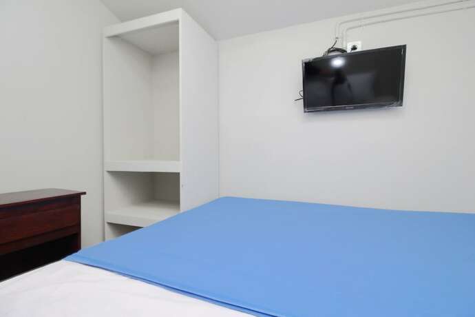 Imagen general del Hotel Kamar Keluarga Bandara IV Syariah. Foto 14