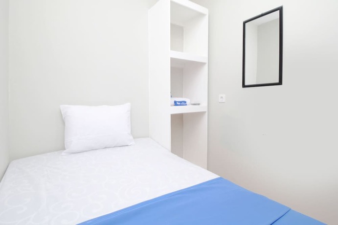 Imagen general del Hotel Kamar Keluarga Bandara Mas Syariah. Foto 5