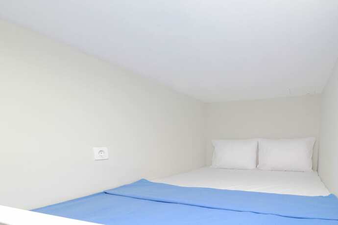 Imagen de la habitación del Hotel Kamar Keluarga Bandara Mas Syariah. Foto 20