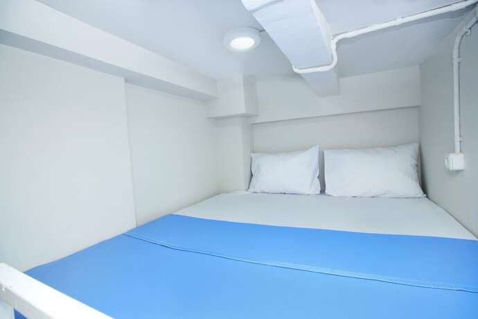 Imagen general del Hotel Kamar Keluarga Bandara VII Syariah. Foto 1
